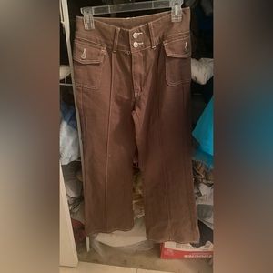 mocha medium rise to high rise seam flare leg jeans